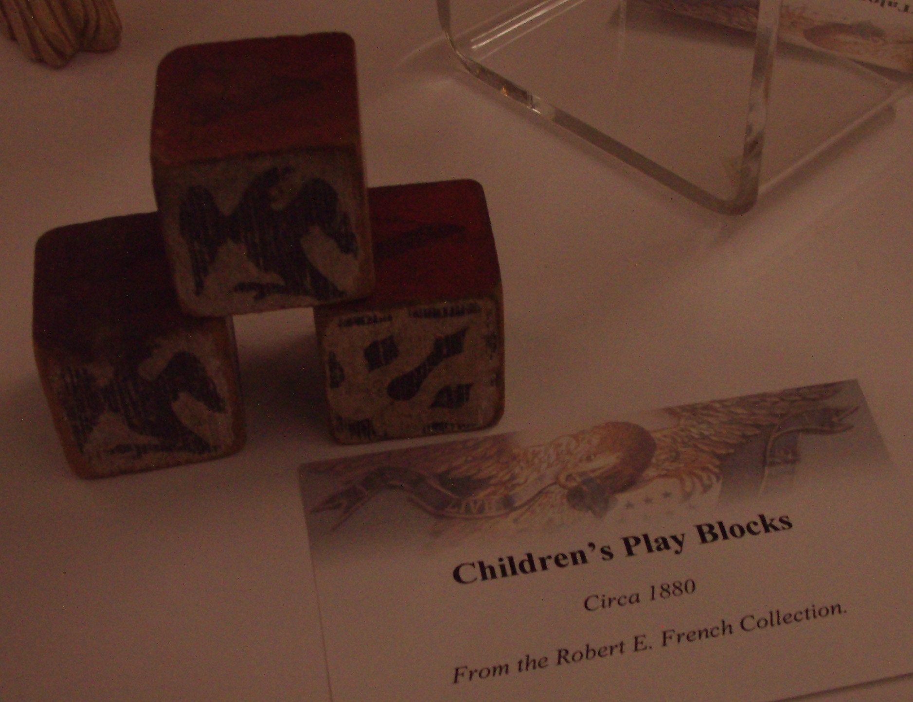 Children sitting together and building with toy blocks